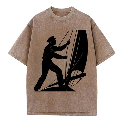 Sailor adjusting the boom on a sailboat - Vintage T-shirt - Brown