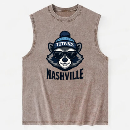 Nashville Raccoon wearing Titans navy and light blue beanie with pom pom and - Vintage Washed Tank - Brown