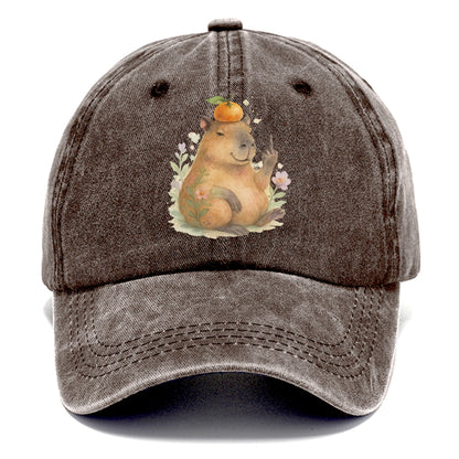 chonky capybara relaxing with orange on head, one webbed middle finger up - Classic Cap - Brown