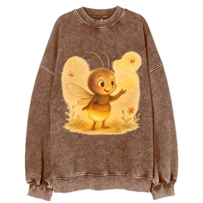 Firefly choreographer arranging synchronized light patterns over a meadow stage - Vintage Sweatshirt - Brown