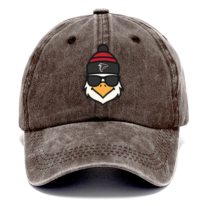 Atlanta Falcon wearing Falcons red and black beanie with pom pom and wayfarer - Classic Cap - Brown