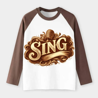 Bold typography design - "SING" - vocal expression, musical soul - Raglan Long Sleeve T-Shirt - Coffee