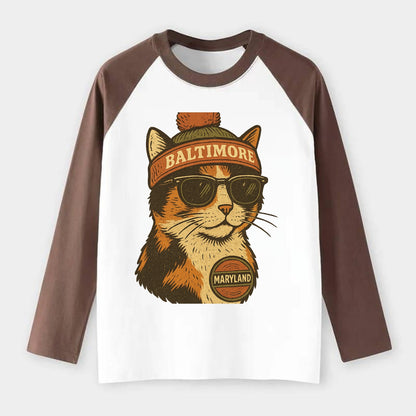 Maryland Calico Cat wearing Baltimore beanie with pom pom and wayfarer - Raglan Long Sleeve T-Shirt - Coffee