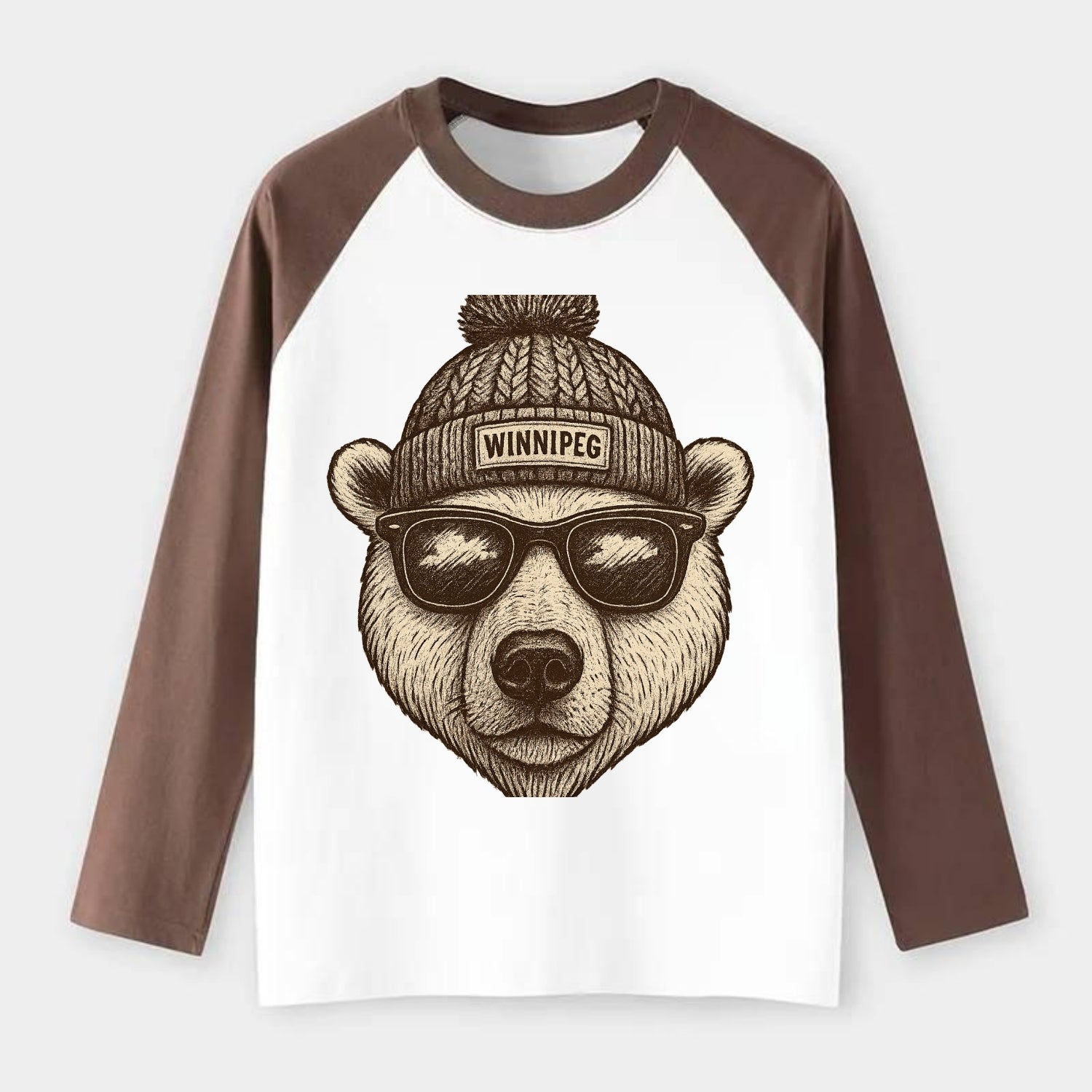 Winnipeg Polar Bear wearing Winnipeg beanie with pom pom and wayfarer - Raglan Long Sleeve T-Shirt - Coffee