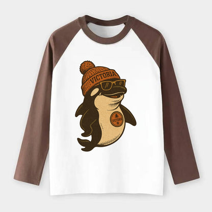 Victoria Orca wearing Victoria beanie with pom pom and wayfarer - Raglan Long Sleeve T-Shirt - Coffee