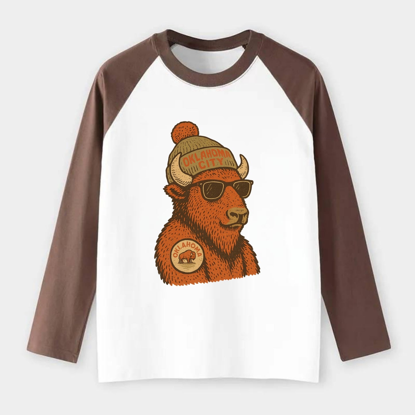 Oklahoma Buffalo wearing Oklahoma City beanie with pom pom and - Raglan Long Sleeve T-Shirt - Coffee