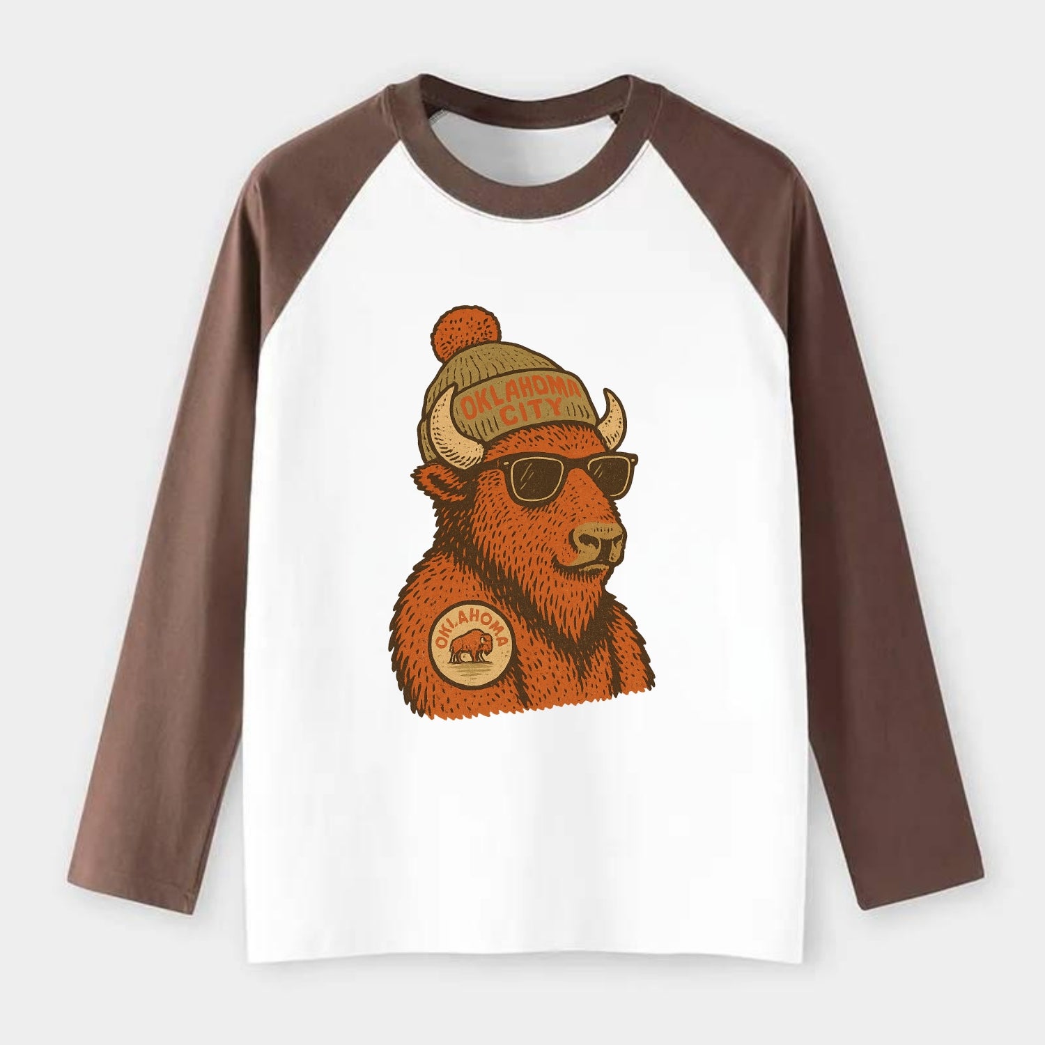 Oklahoma Buffalo wearing Oklahoma City beanie with pom pom and - Raglan Long Sleeve T-Shirt - Coffee