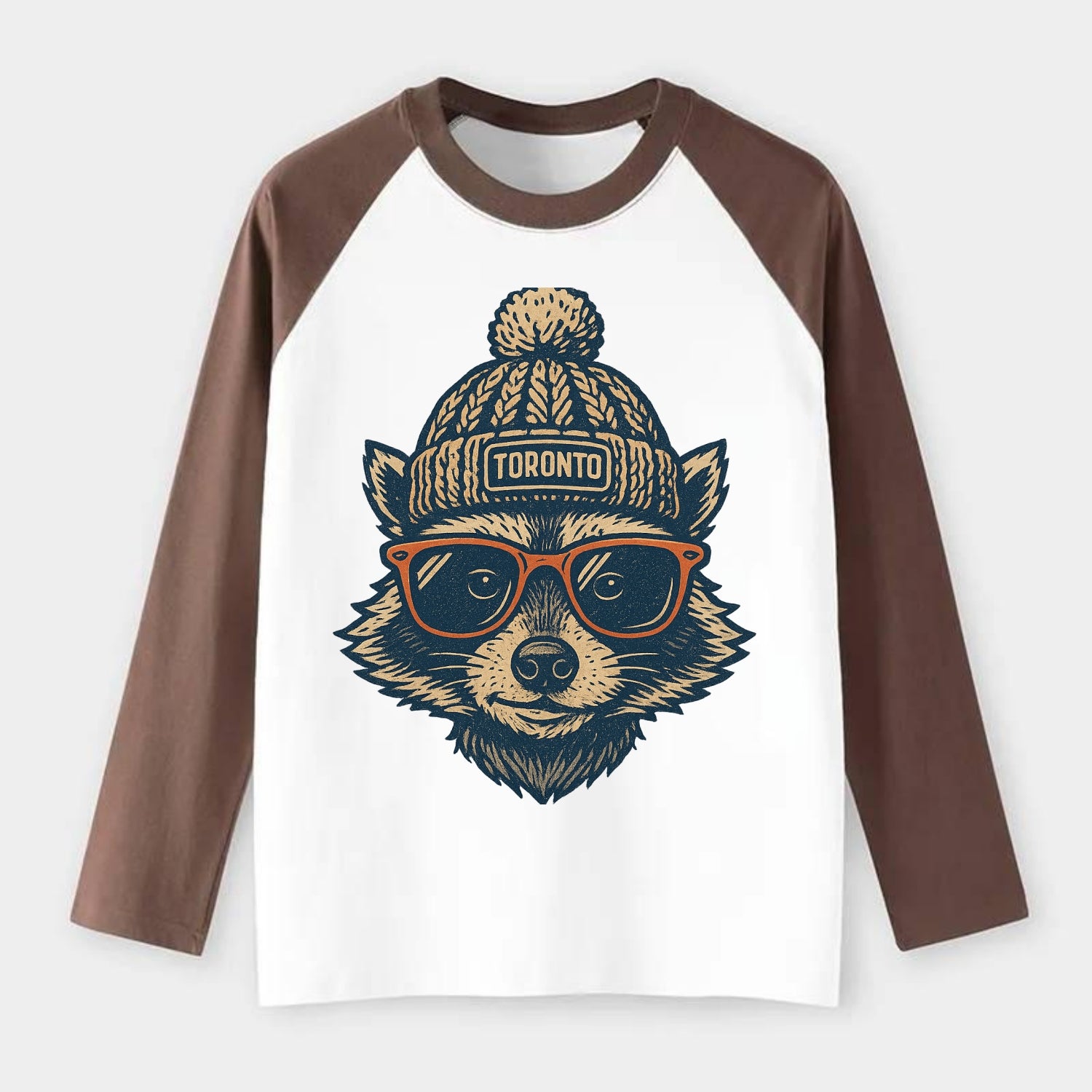Toronto Raccoon wearing Toronto beanie w - Raglan Long Sleeve T-Shirt - Coffee
