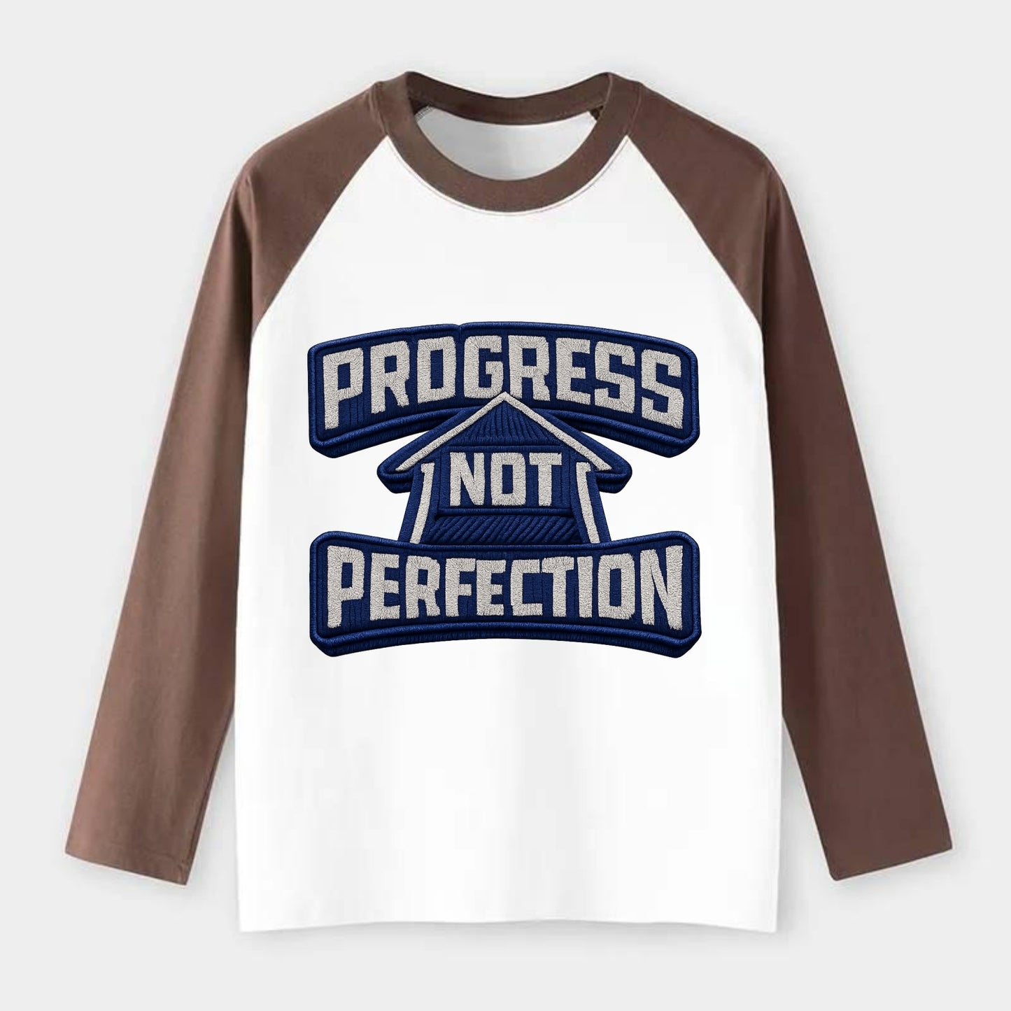 PROGRESS NOT PERFECTION - arrow with text in blue , growth mindset - Raglan Long Sleeve T-Shirt - Coffee