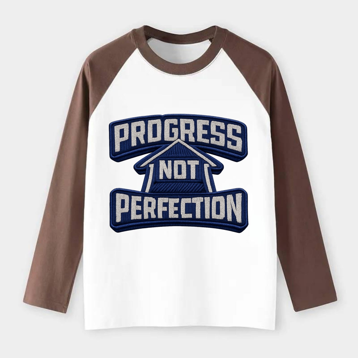 PROGRESS NOT PERFECTION - arrow with text in blue , growth mindset - Raglan Long Sleeve T-Shirt - Coffee