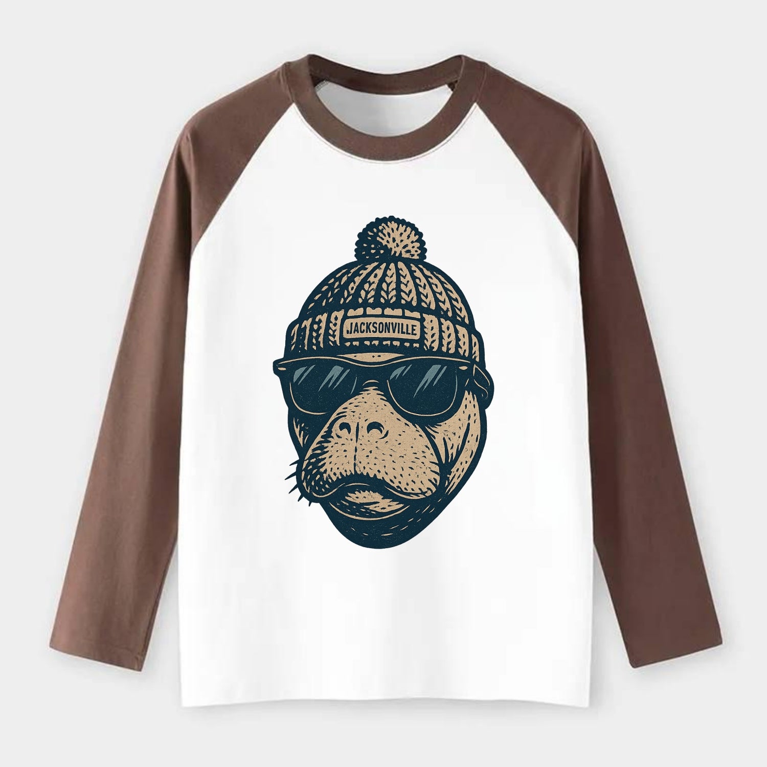 Jacksonville Manatee wearing Jacksonville beanie with pom pom and - Raglan Long Sleeve T-Shirt - Coffee