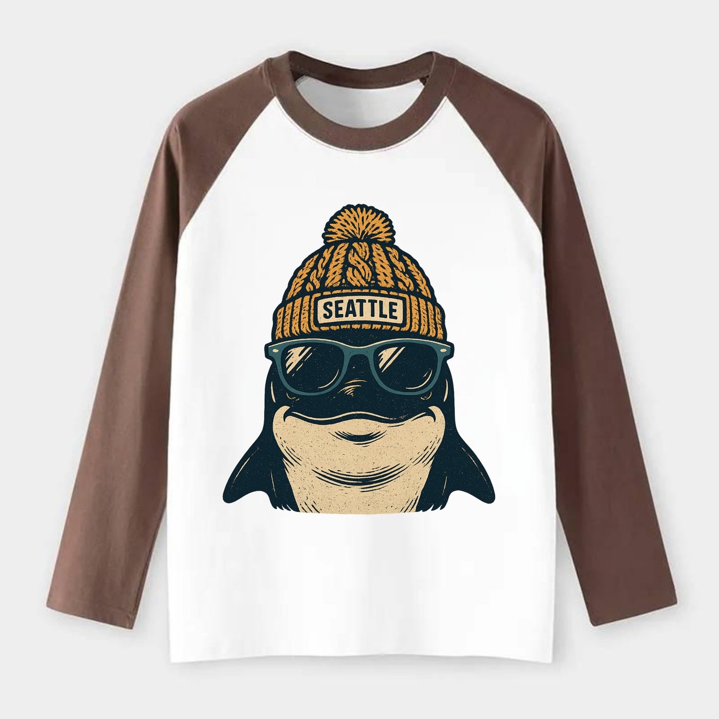 Seattle Orca wearing Seattle beanie with pom pom and wayfarer - Raglan Long Sleeve T-Shirt - Coffee