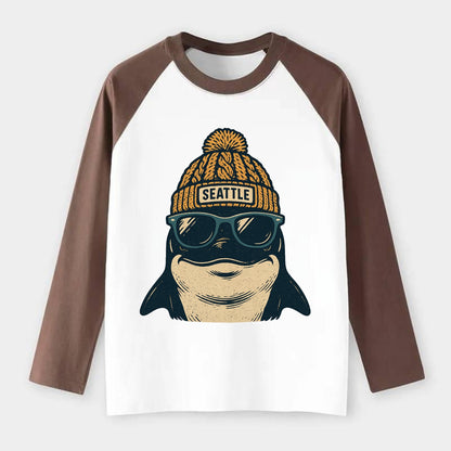 Seattle Orca wearing Seattle beanie with pom pom and wayfarer - Raglan Long Sleeve T-Shirt - Coffee