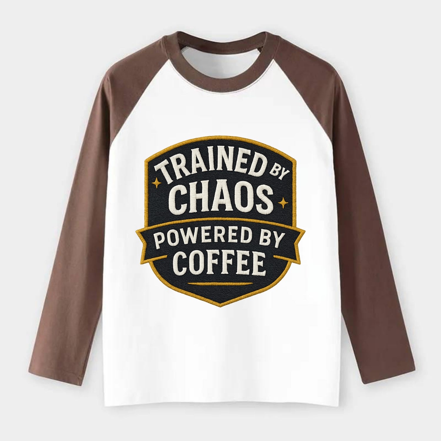 Trained by chaos, powered by coffee - Raglan Long Sleeve T-Shirt - Coffee
