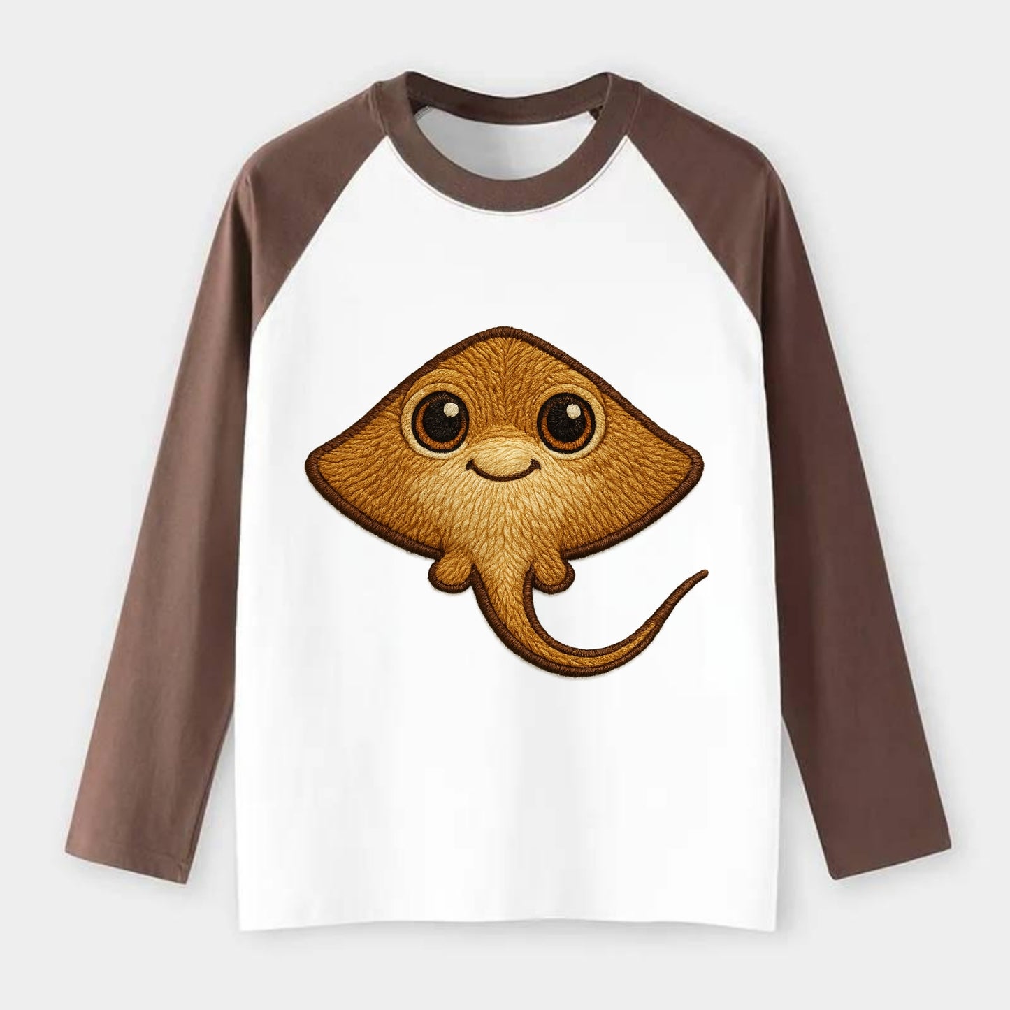 Baby Stingray - flat body, long tail, eyes on top, front-facing, - Raglan Long Sleeve T-Shirt - Coffee