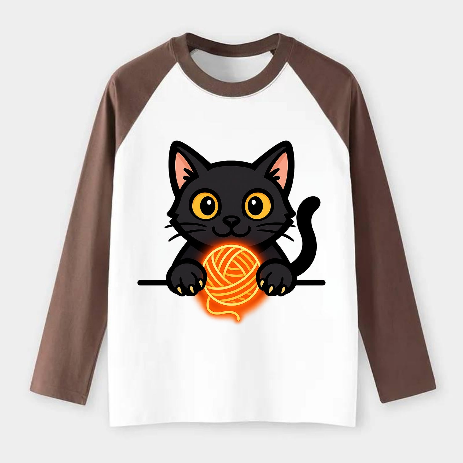 Midnight the black cat popping out of a gift box lid with ribbon - Raglan Long Sleeve T-Shirt - Coffee