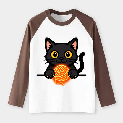 Midnight the black cat popping out of a gift box lid with ribbon - Raglan Long Sleeve T-Shirt - Coffee