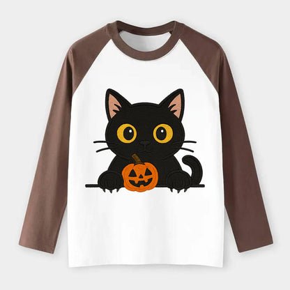 Midnight the black cat wearing round spectacles while studying the - Raglan Long Sleeve T-Shirt - Coffee