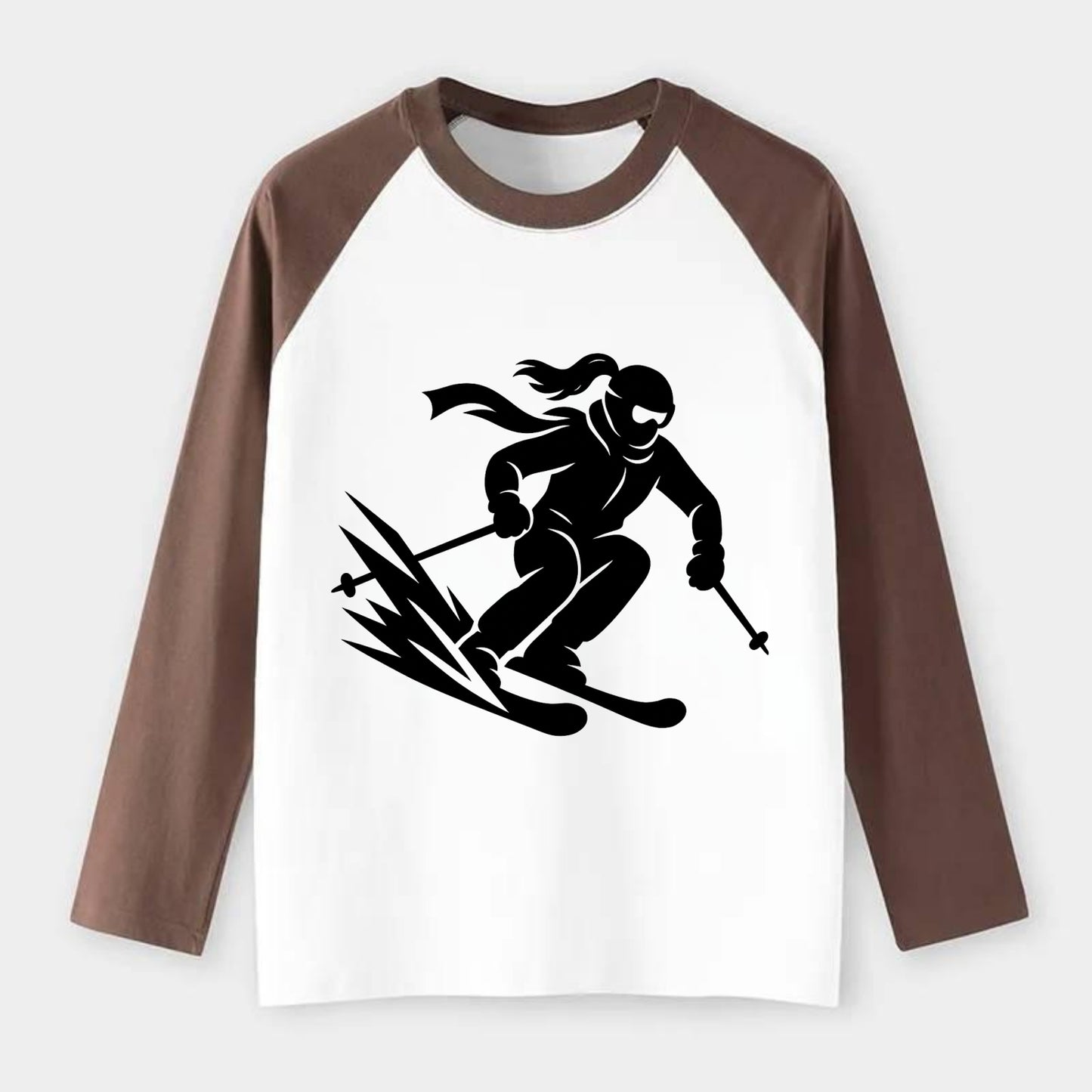 Skier carving down snowy slope - Raglan Long Sleeve T-Shirt - Coffee
