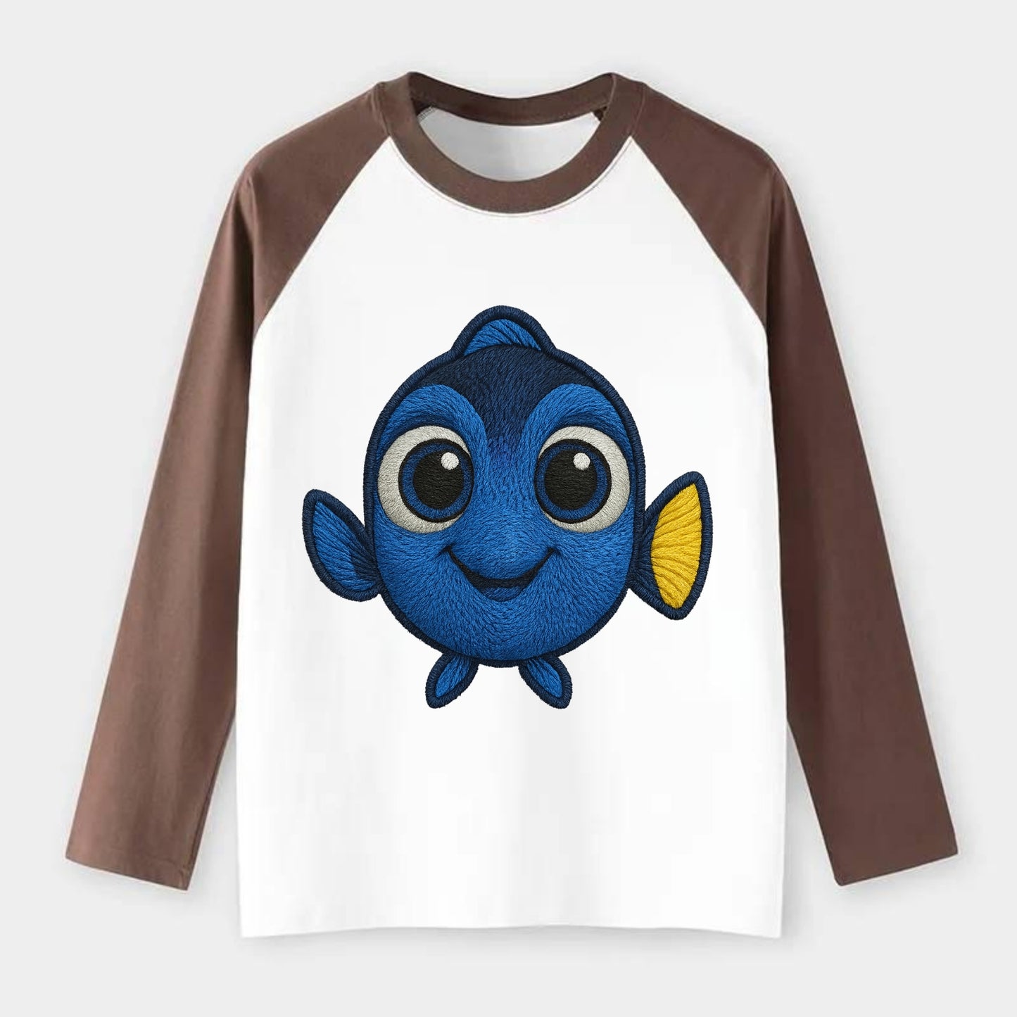 Baby Blue Tang - bright blue with yellow tail, big eyes, front-facing, - Raglan Long Sleeve T-Shirt - Coffee