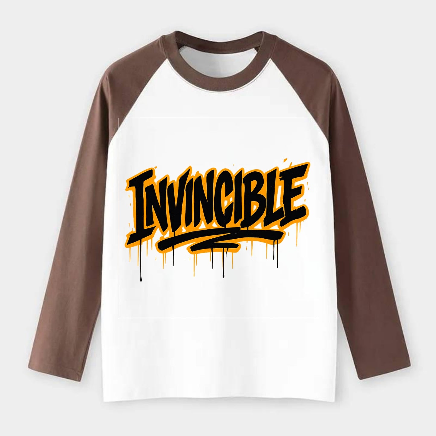 Bold typography design - "INVINCIBLE" - cannot be defeated, - Raglan Long Sleeve T-Shirt - Coffee