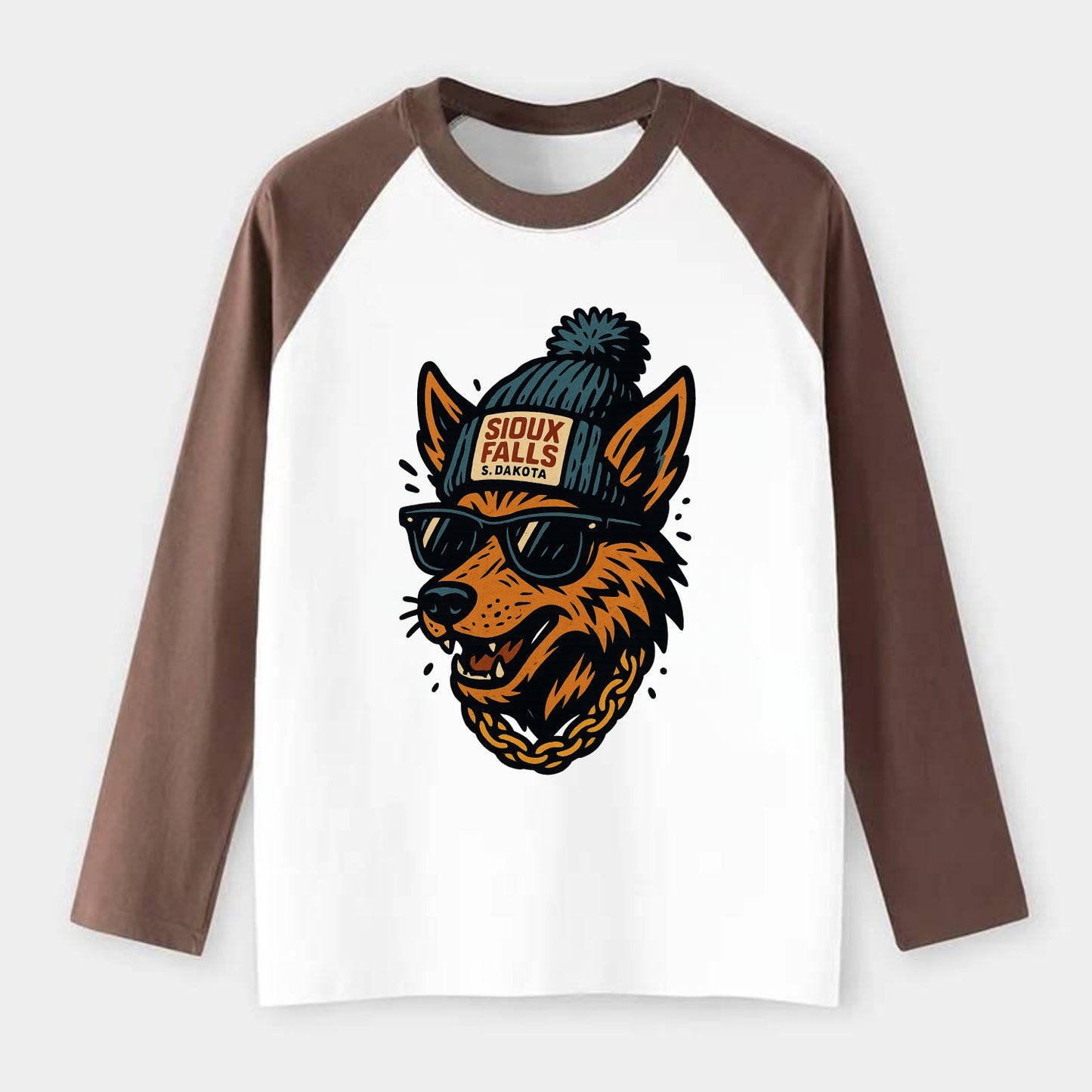 South Dakota Coyote wearing Sioux Falls beanie with pom pom and - Raglan Long Sleeve T-Shirt - Coffee