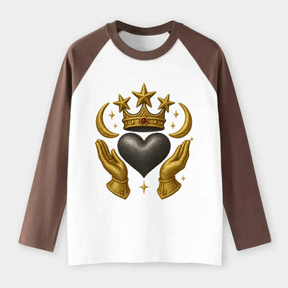 Sun goddess crown radiating golden rays over a midnight heart with - Raglan Long Sleeve T-Shirt - Coffee