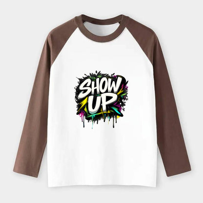 Bold typography design - "SHOW UP" - be present, arrive ready - Raglan Long Sleeve T-Shirt - Coffee