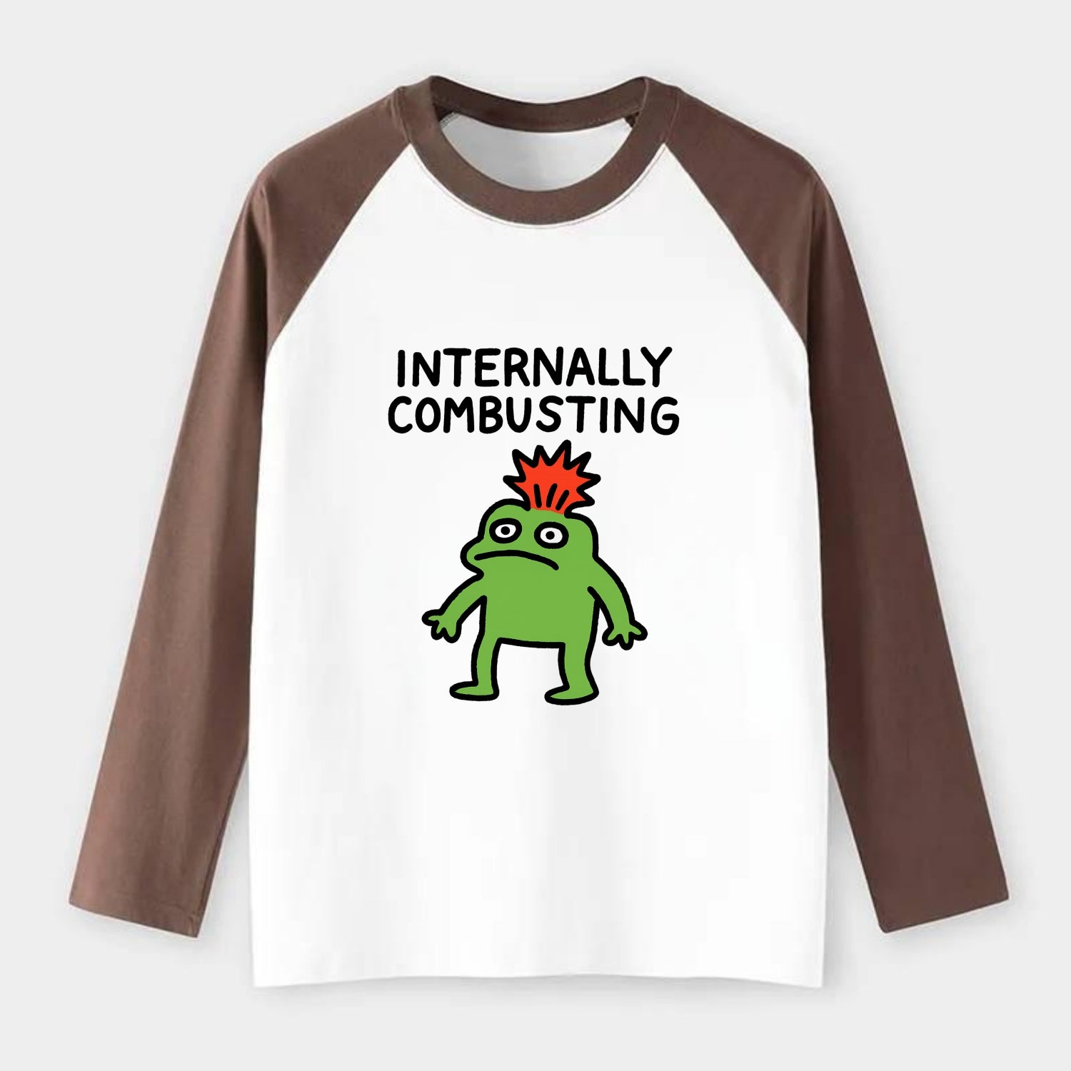 INTERNALLY COMBUSTING | Calm exterior exploding inside - Raglan Long Sleeve T-Shirt - Coffee