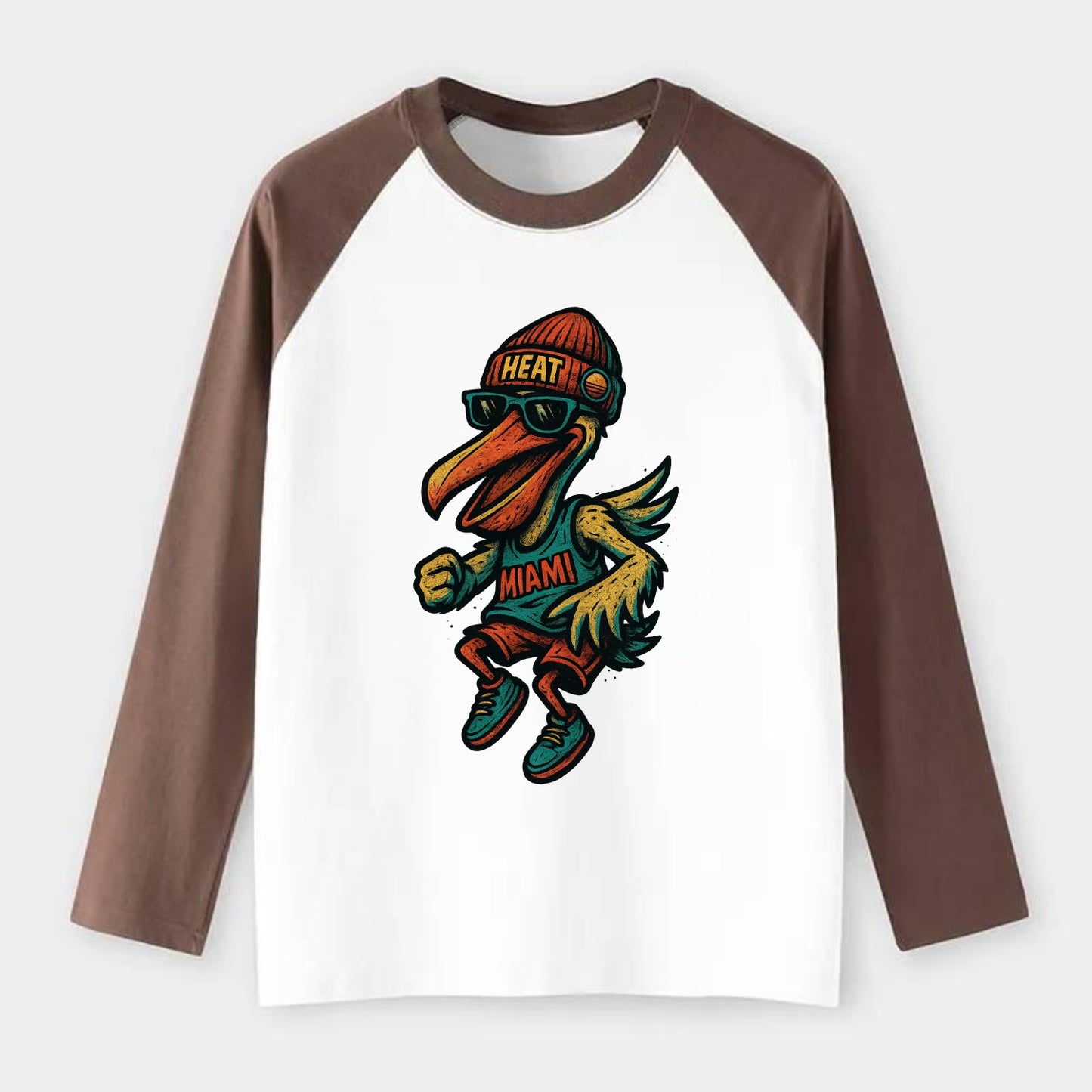 Miami Pelican wearing Heat beanie with sunset patch and wayfarer - Raglan Long Sleeve T-Shirt - Coffee