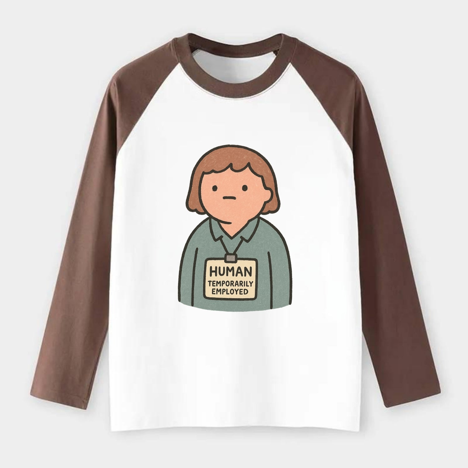 Worker wearing ID badge that says "Human - Temporarily Employed" - - Raglan Long Sleeve T-Shirt - Coffee