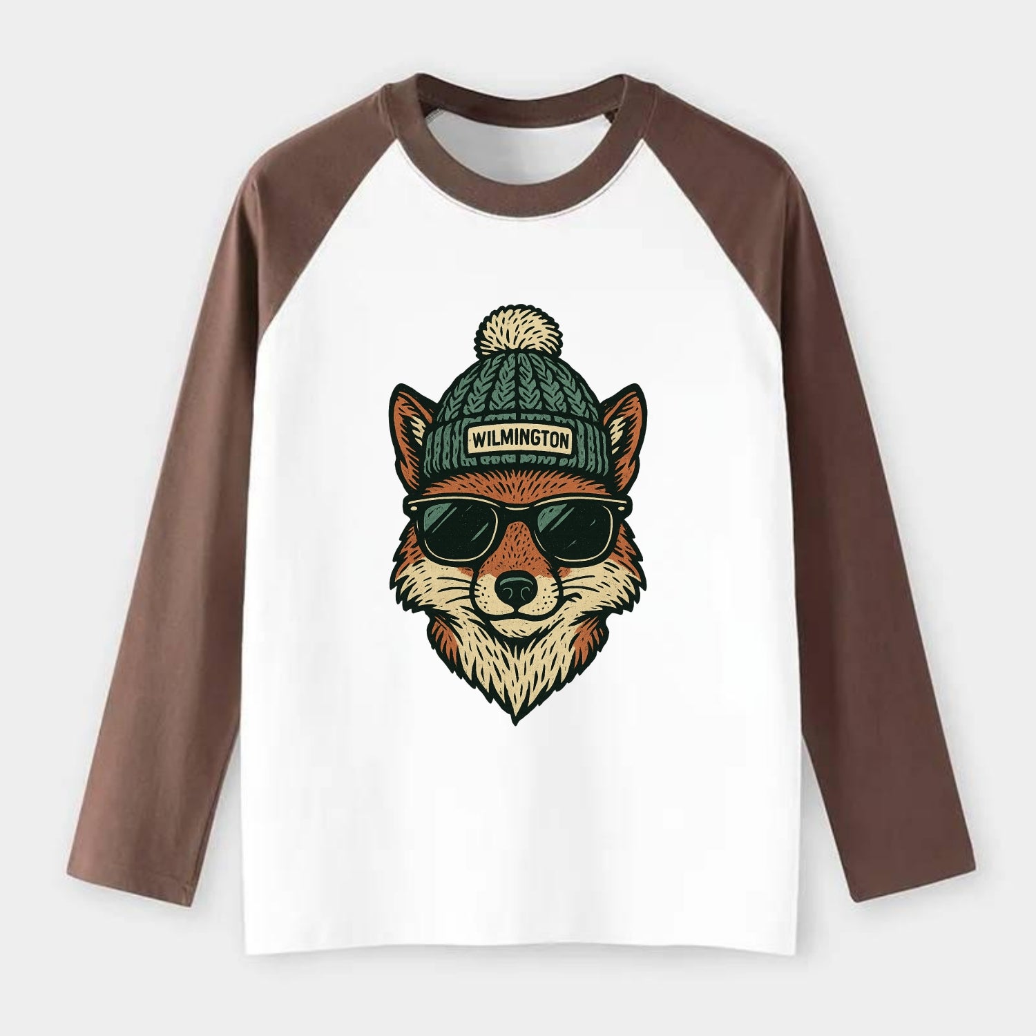 Delaware Gray Fox wearing Wilmington beanie with pom pom and wayfarer - Raglan Long Sleeve T-Shirt - Coffee