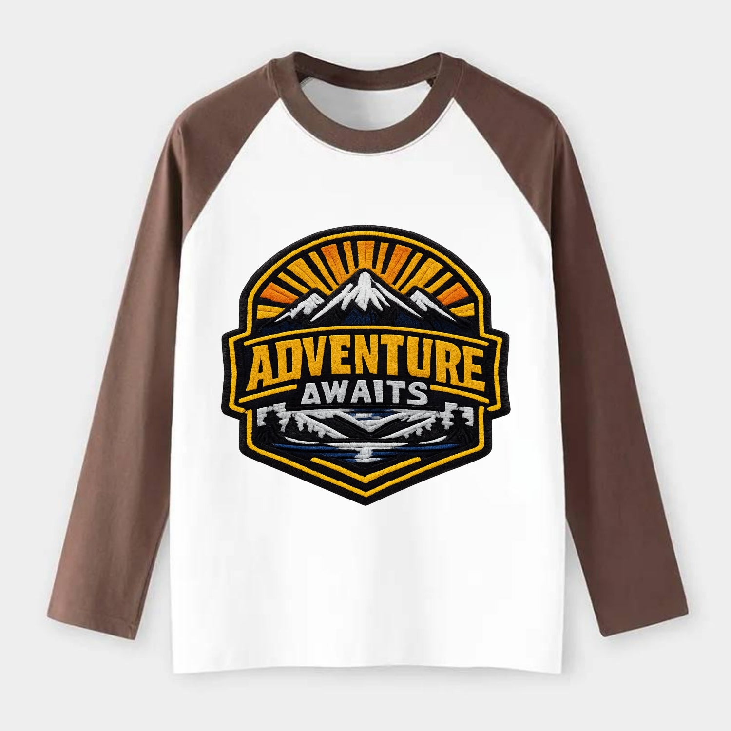 ADVENTURE AWAITS - mountain sunrise with text in gold and blue , - Raglan Long Sleeve T-Shirt - Coffee
