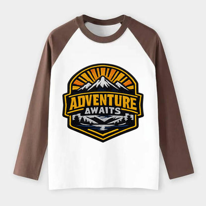 ADVENTURE AWAITS - mountain sunrise with text in gold and blue , - Raglan Long Sleeve T-Shirt - Coffee