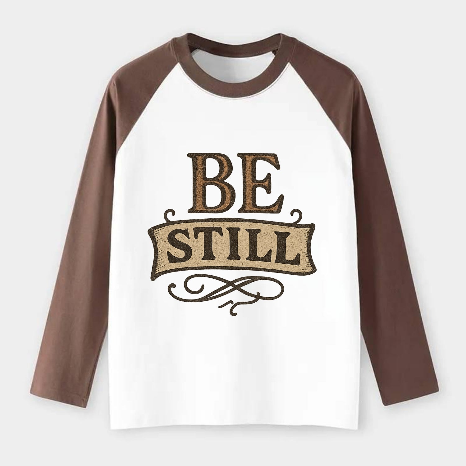 Bold typography design - "BE STILL" - quiet mind, meditation, inner - Raglan Long Sleeve T-Shirt - Coffee