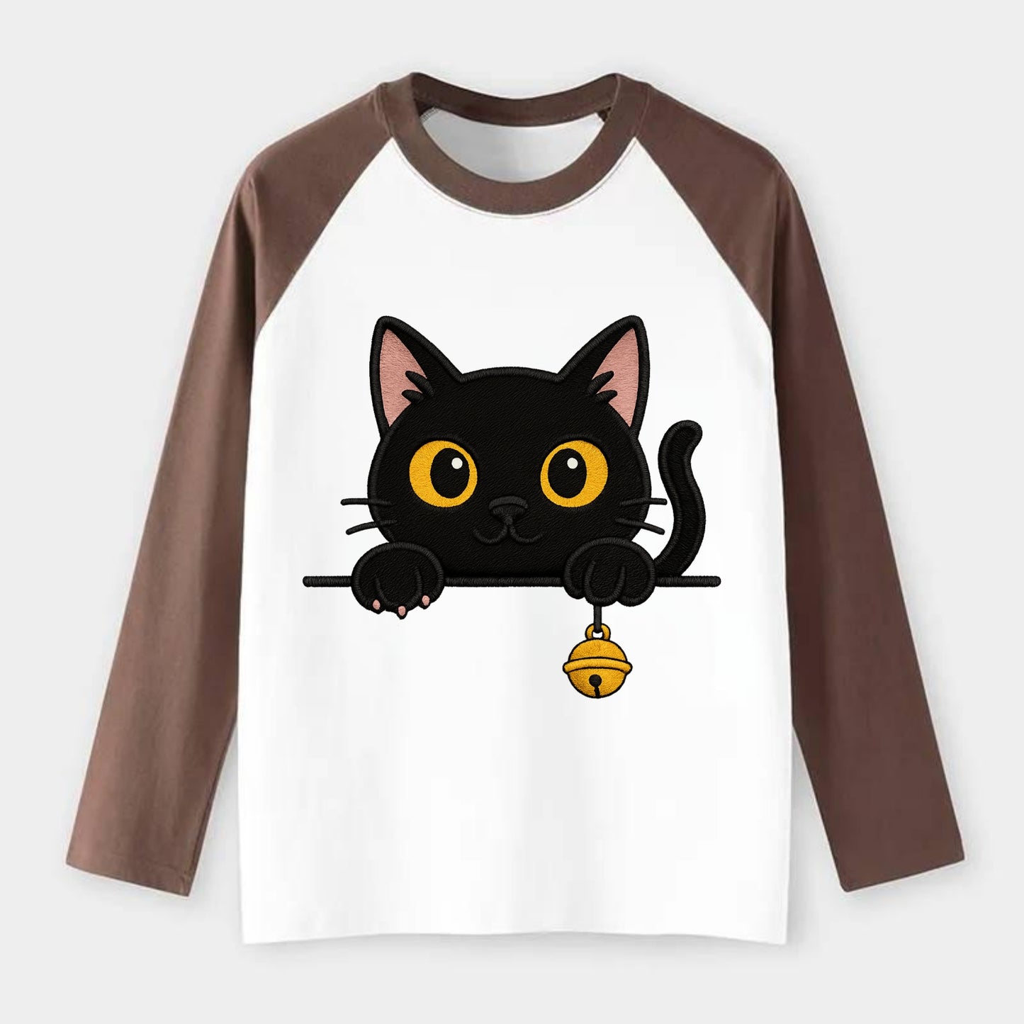 Midnight the black cat leaning sideways with chin resting on left paw. - Raglan Long Sleeve T-Shirt - Coffee