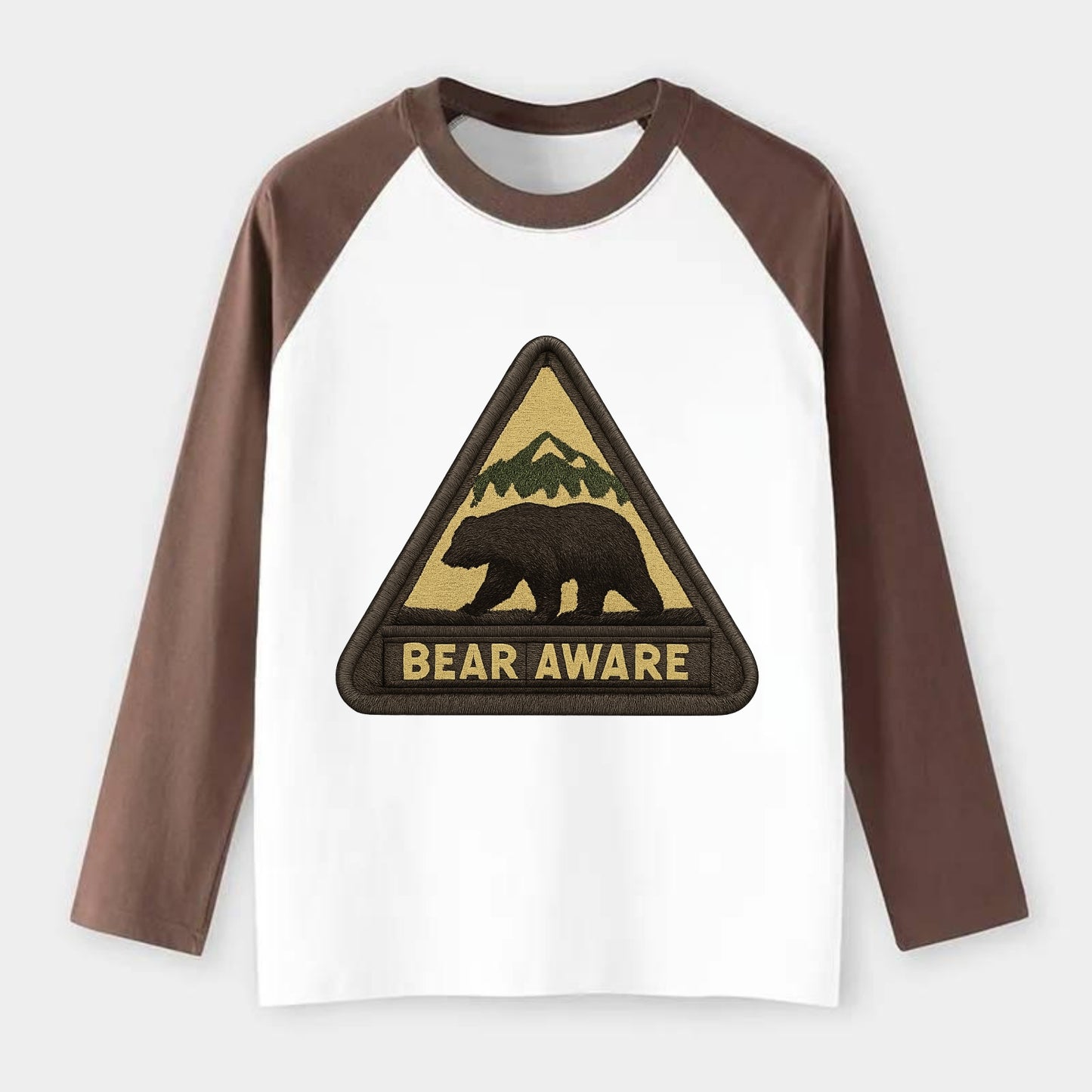 BEAR AWARE - bear silhouette warning in brown and yellow , wilderness - Raglan Long Sleeve T-Shirt - Coffee