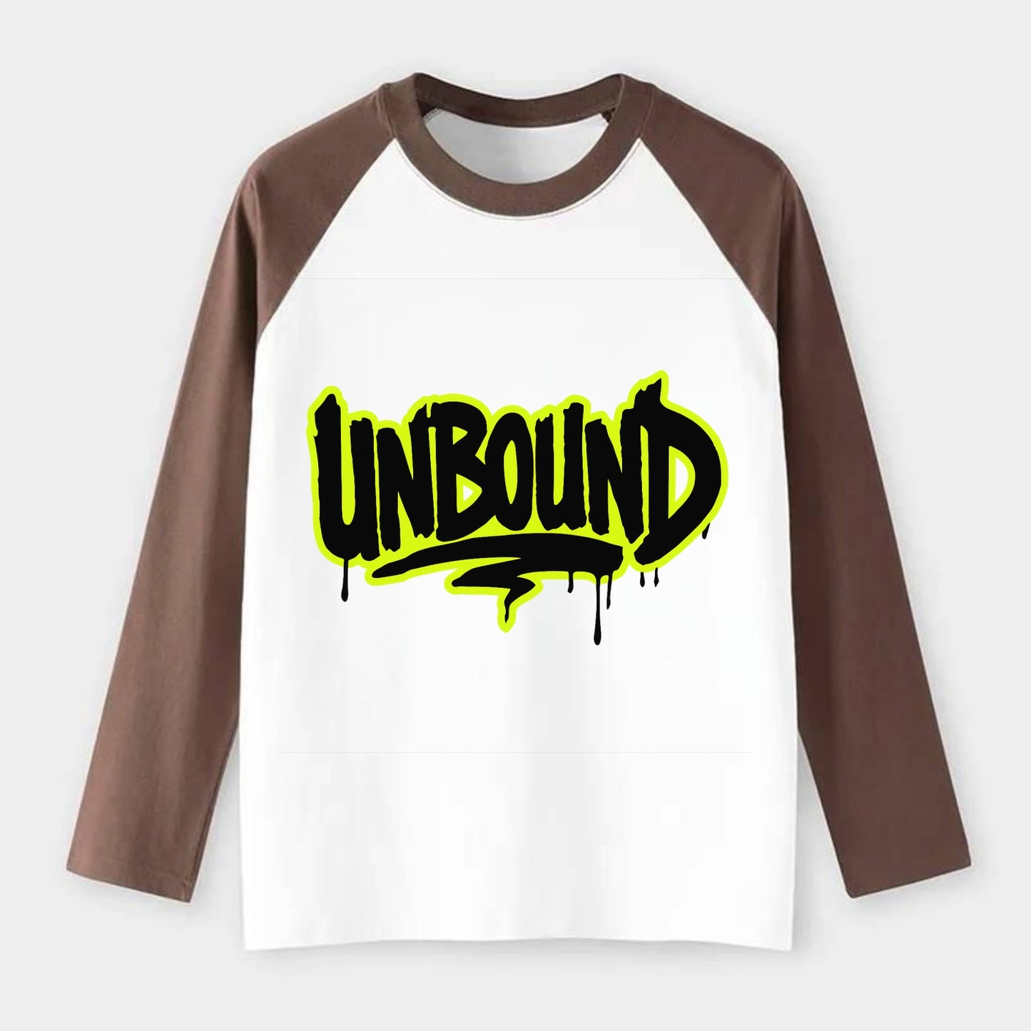 Bold typography design - "UNBOUND" - without limits, free from - Raglan Long Sleeve T-Shirt - Coffee