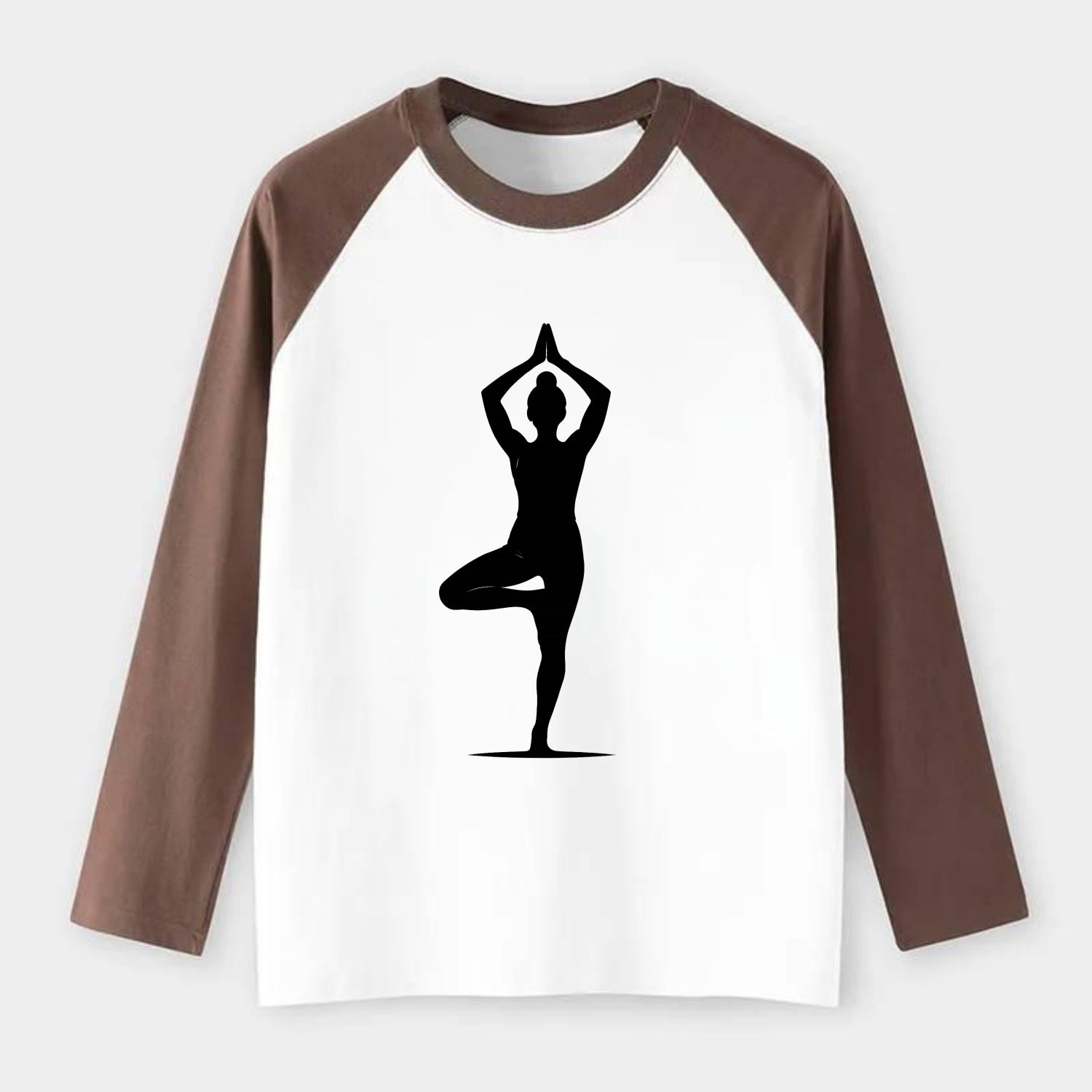 Yoga practitioner in tree pose - Raglan Long Sleeve T-Shirt - Coffee