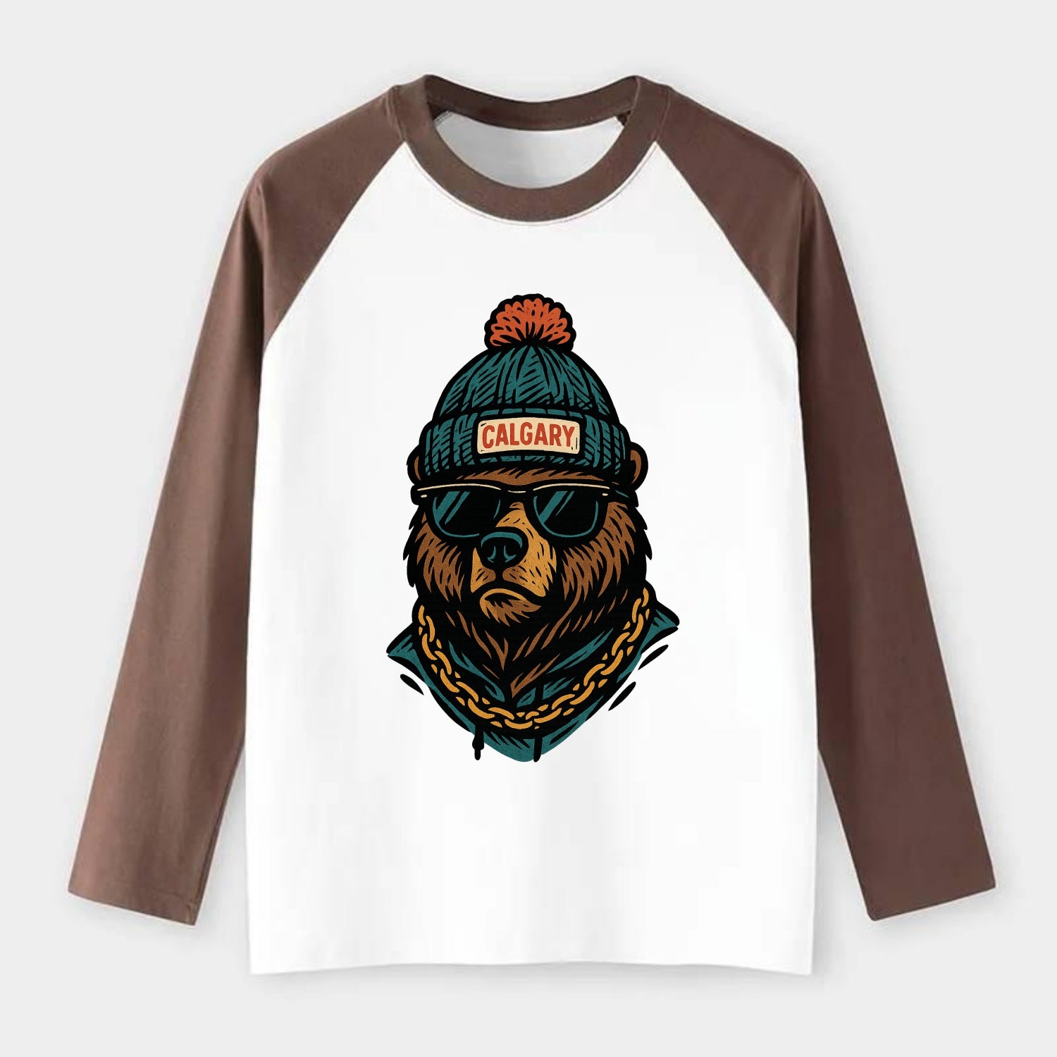 Calgary Grizzly Bear wearing Calgary beanie with pom pom and wayfarer - Raglan Long Sleeve T-Shirt - Coffee