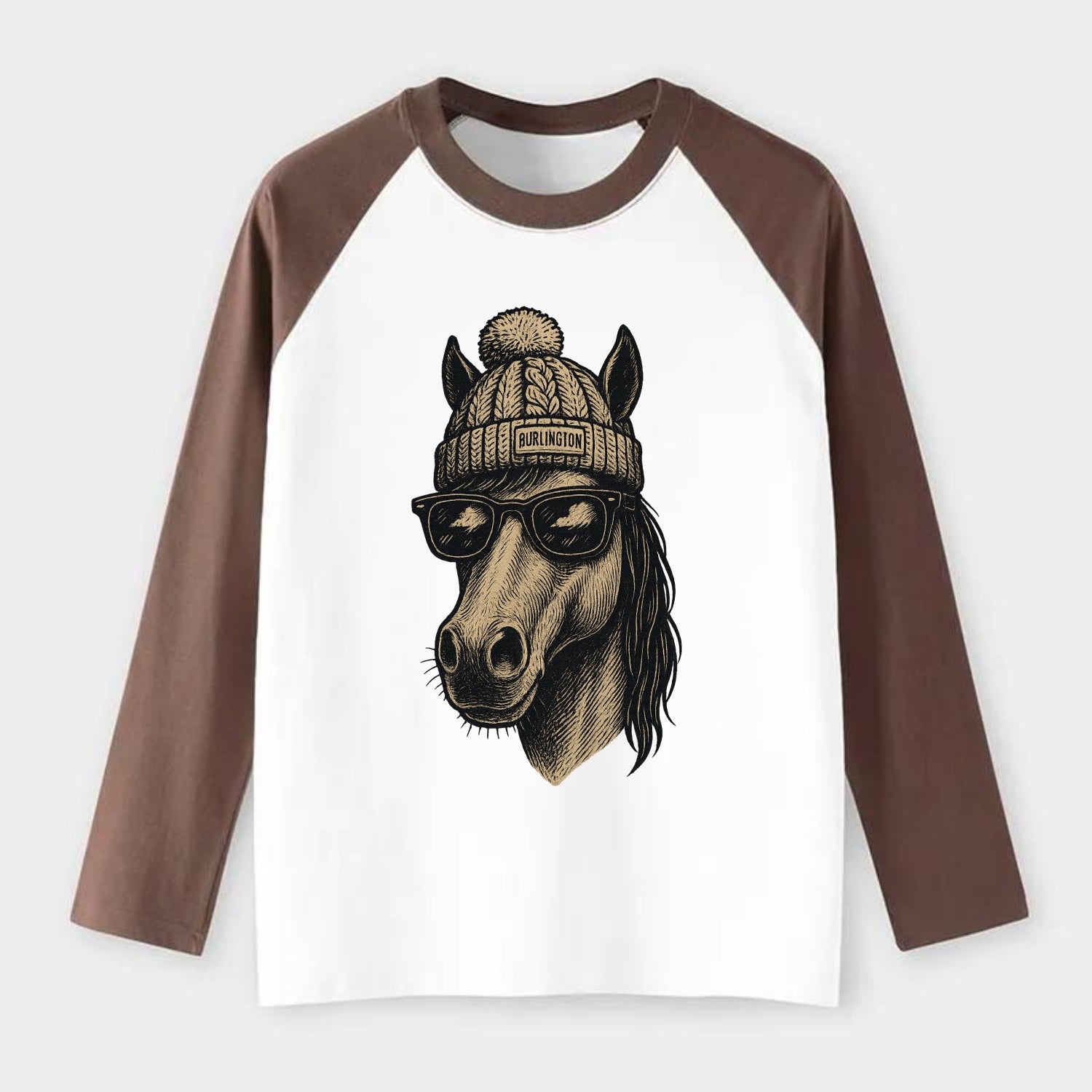 Vermont Morgan Horse wearing Burlington beanie with pom pom and - Raglan Long Sleeve T-Shirt - Coffee