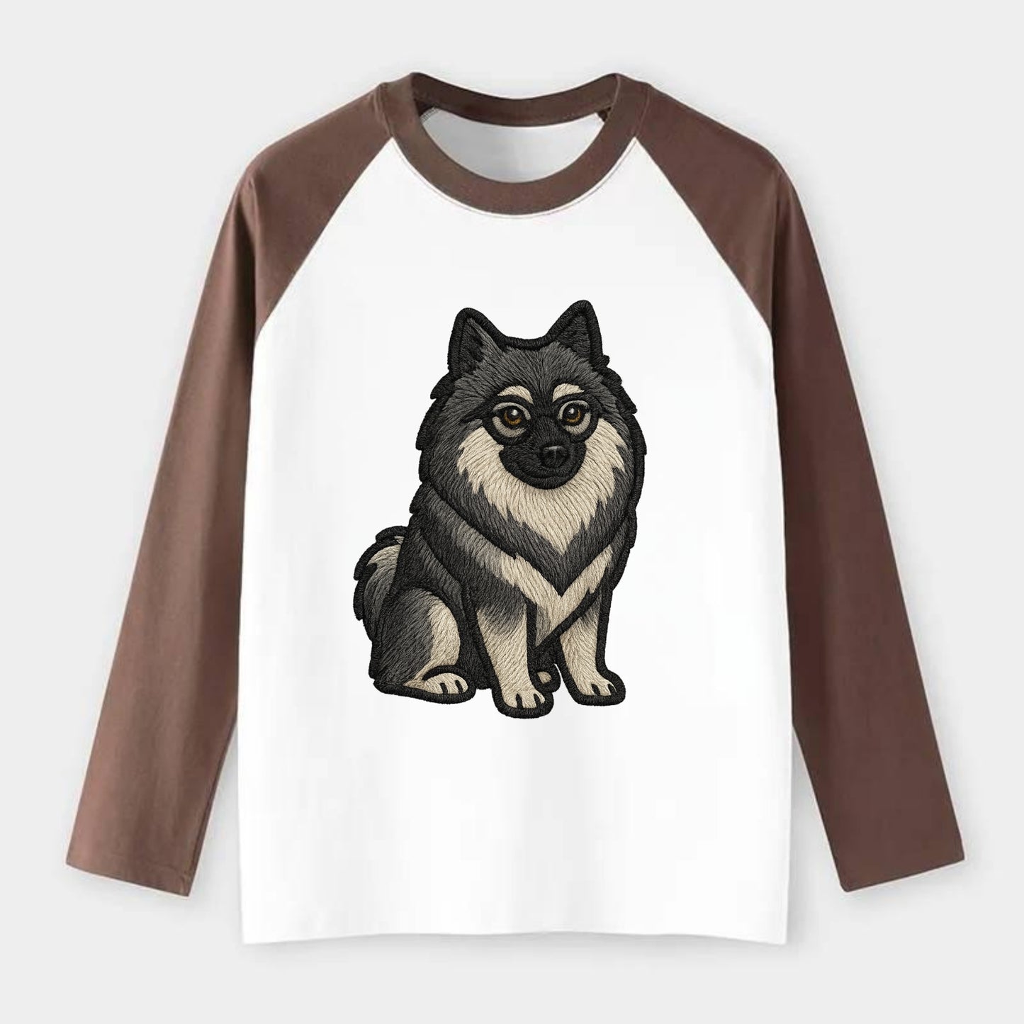 Keeshond - Gray and black spectacles embroidered design - Raglan Long Sleeve T-Shirt - Coffee