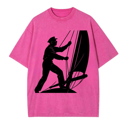 Sailor adjusting the boom on a sailboat - Vintage T-shirt - Dusty Rose(Rose)