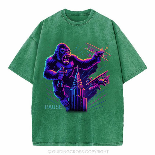 giant gorilla on top of skyscraper holding small figure, swatting planes - Vintage T-shirt - Forest Mist(Green)