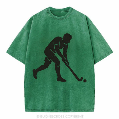 Field hockey player striking the ball - Vintage T-shirt - Forest Mist(Green)