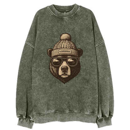 New Mexico Black Bear wearing Albuquerque beanie with pom pom and wayfarer - Vintage Sweatshirt - Forest Mist(Green)