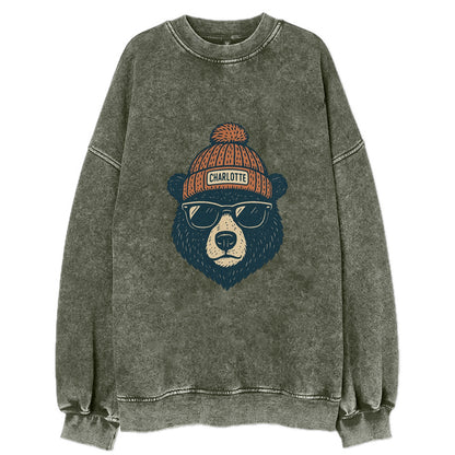 North Carolina Black Bear wearing Charlotte beanie with pom pom and wayfarer - Vintage Sweatshirt - Forest Mist(Green)