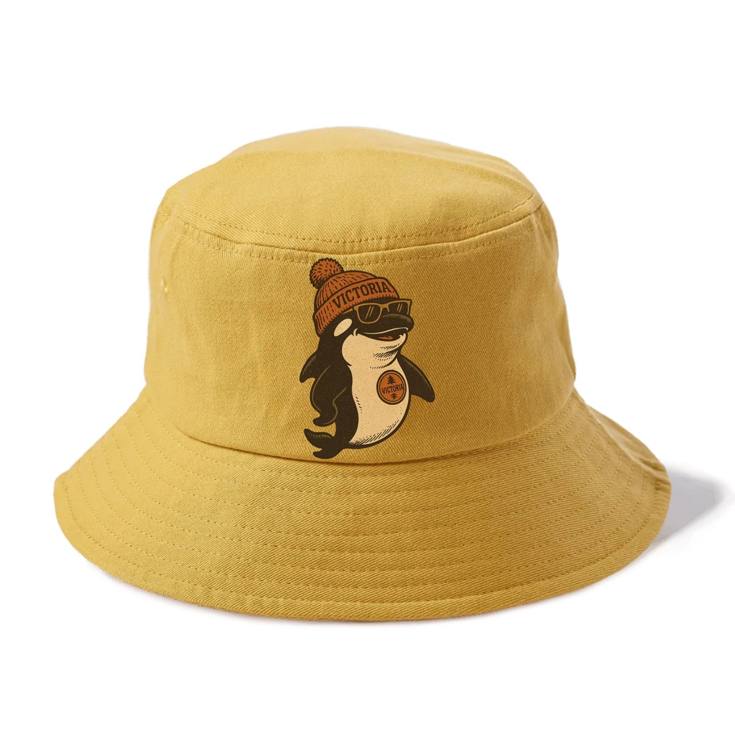 Victoria Orca wearing Victoria beanie with pom pom and wayfarer sunglasses - Bucket Hat - Golden Harvest(Yellow)