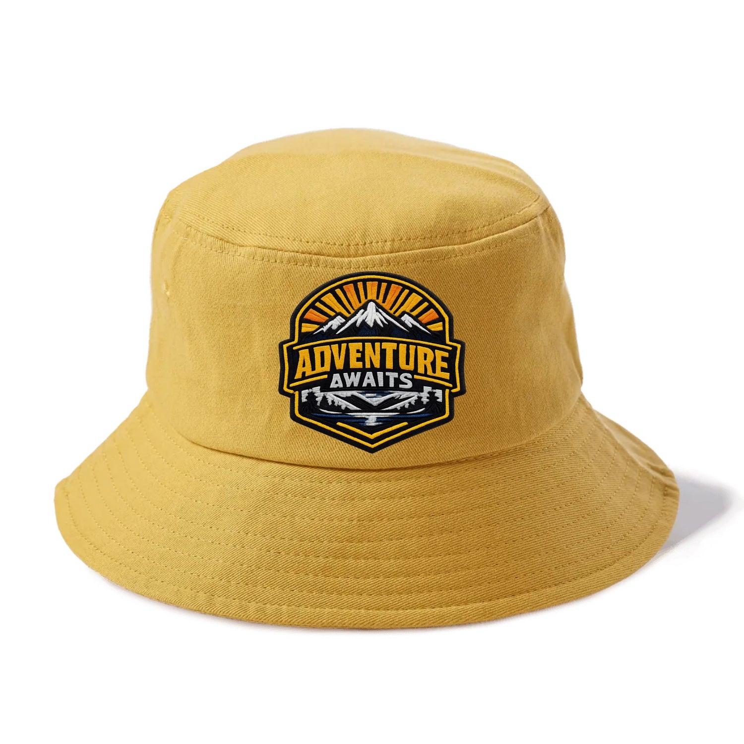 ADVENTURE AWAITS - mountain sunrise with text in gold and blue , wanderlust - Bucket Hat - Golden Harvest(Yellow)