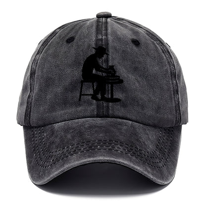 Potter shaping clay on wheel - Classic Cap - Graphite